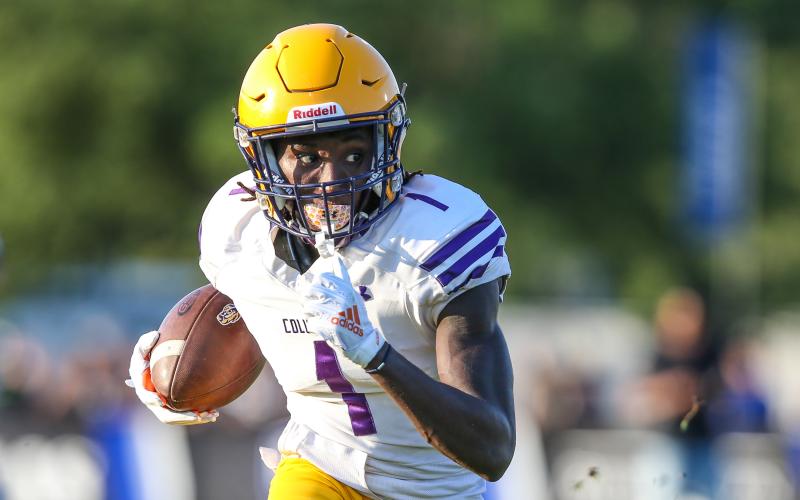 Columbia receiver Jaden Williams runs up the field after a catch during last year’s spring game against Bartram Trail. (FILE)