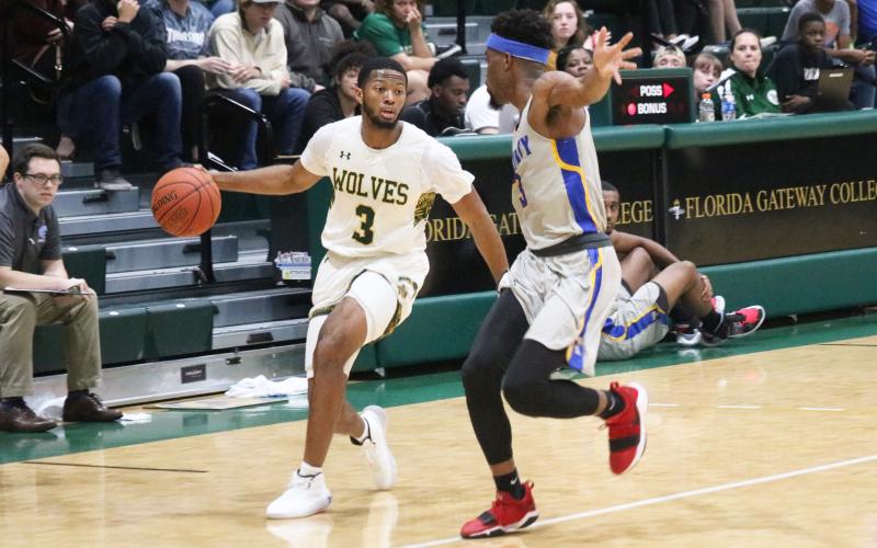 FGC guard Kenny Brown Jr. looks to drive against Trinity Baptist on Jan. 16. (JORDAN KROEGER/Lake City Reporter)