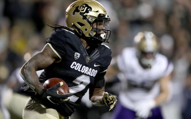 Laviska Shenault Jr. of the Colorado Buffaloes carries the ball against the Washington Huskies in the first quarter at Folsom Field on Nov. 23, 2019 in Boulder, Colorado. (MATTHEW STOCKMAN/Getty Images/TNS)