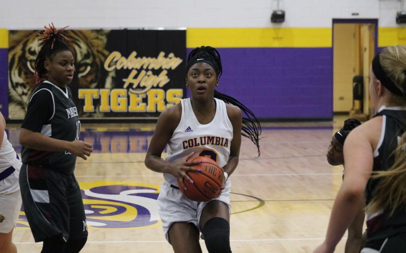 Columbia guard Na’Haviya Paxton gets set to take a shot against Madison County on Jan. 28. (FILE)