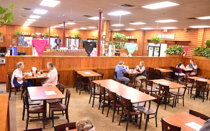 This is what a lunch rush looks like under the current quarantine rules, which restrict restaurants to 25% capacity. Ole Times Country Buffet, where the photo was taken last week, may start seeing those empty seats fill up soon, as the state is expected to relax the rules on eateries. (CARL MCKINNEY/Lake City Reporter)