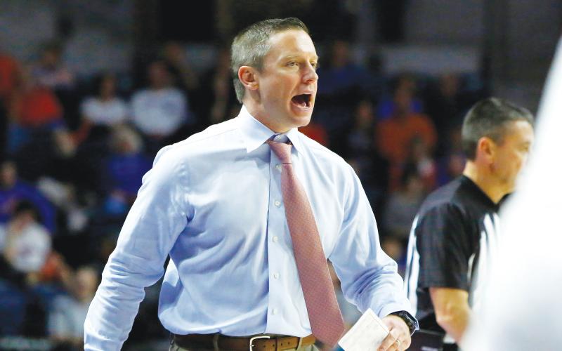 Florida coach Mike White yells to his players during a game against Mississippi on Jan. 14, in Gainesville. (AP FILE PHOTO)