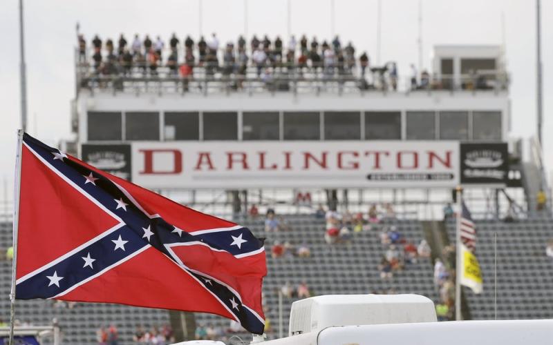 AConfederate flag flies in the infield before a NASCAR Xfinity auto race at Darlington Raceway on Sept. 5, 2015, in Darlington, S.C. (TERRY RENNA/AP File photo)