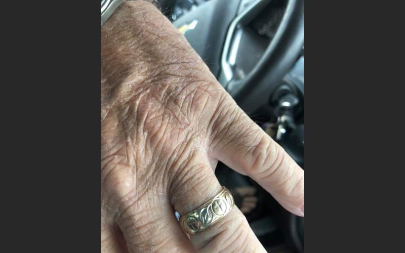 Tommy Smith models his recovered wedding band. (COURTESY)