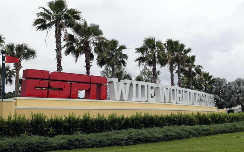 A sign marking the entrance to ESPN's Wide World of Sports at Walt Disney World is seen Wednesday, in Kissimmee. (JOHN RAOUX/AP Photo)