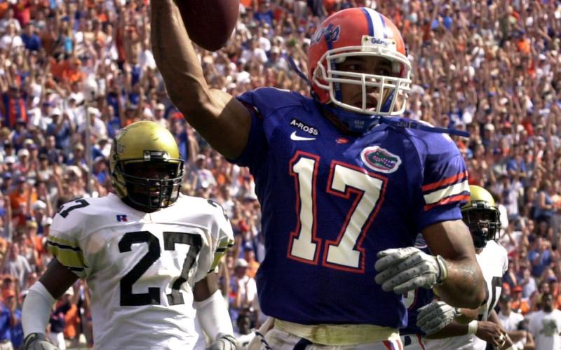 Reche Caldwell celebrates a touchdown against Vanderbilt in 2001. (TRIBUNE NEWS SERVICE)