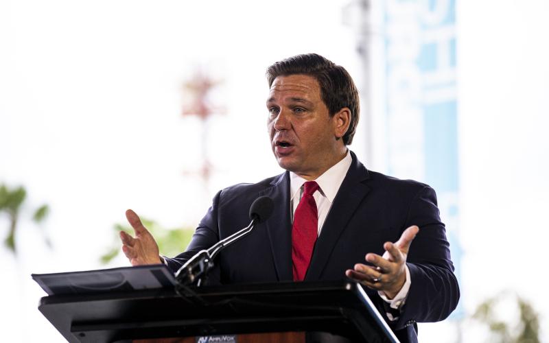 Gov. Ron DeSantis delivers remarks during a press conference at NBC Sports Grill &amp; Brew at Universal CityWalk on June 3. (TRIBUNE NEWS SERVICE)