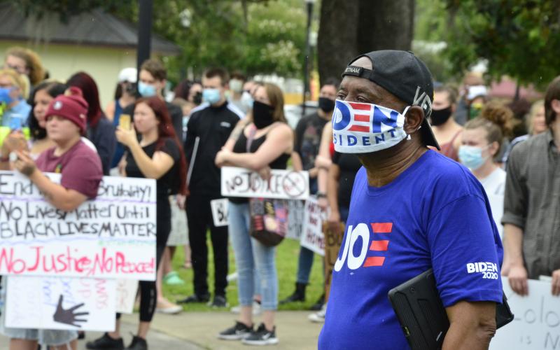Local activist Glenel Bowden, a former Lake City Council member and congressional staffer, thinks quietly to himself. During the rally, the entire crowd went silent for several minutes to reflect on those who have been killed by law enforcement. (CARL MCKINNEY/Lake City Reporter)