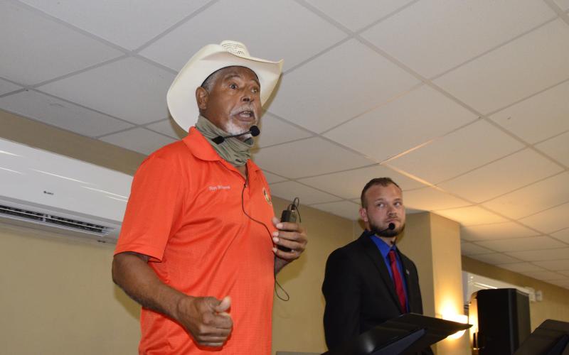 Long-time County Commission District 1 incumbent Ron Williams squares off with challenger Kyle Green during a Q&amp;A session at a Republican-sponsored event Saturday night. Local GOP Chairman Hunter Peeler acted as moderator. (CARL MCKINNEY/Lake City Reporter)