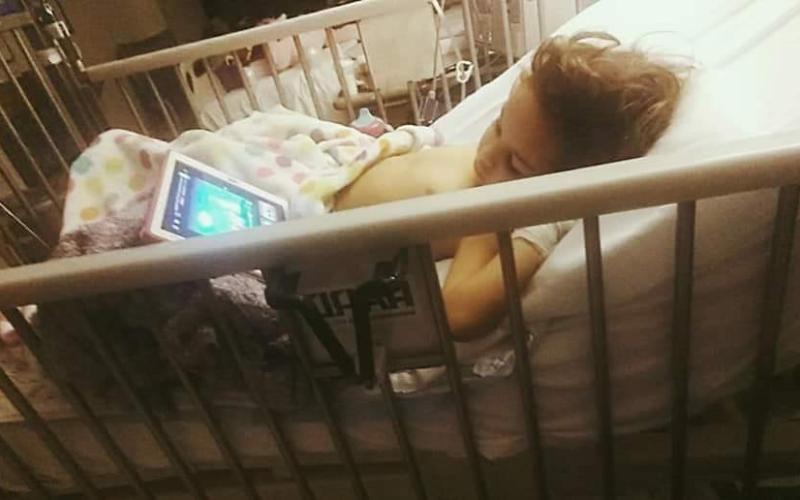 Three-year-old Bristol Risner recovers in the hospital after a disfiguring lawnmower accident. The young girl’s left foot had to be amputated on Wednesday, but the family is thankful she’s alive. (COURTESY)