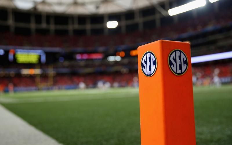 An SEC logo is seen on an end zone pylon before the Missouri Tigers take on the Auburn Tigers during the SEC Championship Game on Dec. 7, 2013 at the Georgia Dome in Atlanta, Georgia. The conference announced Tuesday that it's postponing the start of its volleyball, soccer and cross country seasons through at least Aug. 31. (MIKE EHRMANN/Getty Images/TNS)