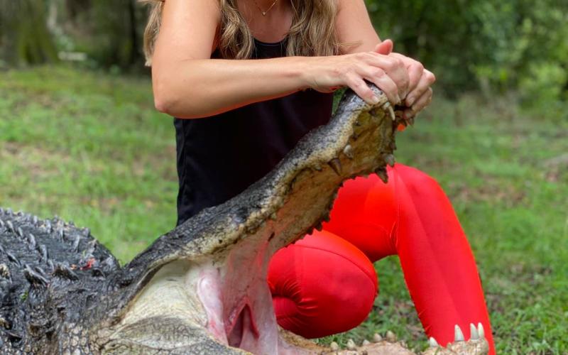 Amy Smith said it took five hours of fighting ‘Big John’ to pull the massive alligator from the pond. (COURTESY STEPHEN AND AMY SMITH)