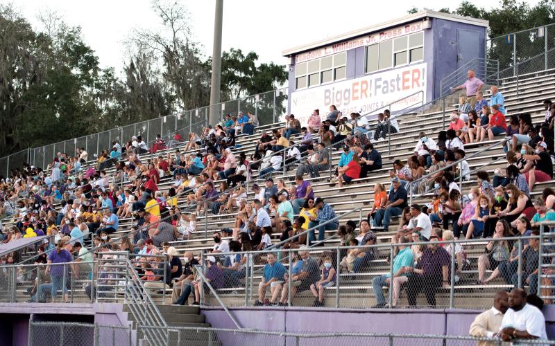 Parents and family members sat with social distancing in mind in the stands Saturday night at Columbia’s graduation ceremony. (RAY CARPENTER/Lake City Reporter)