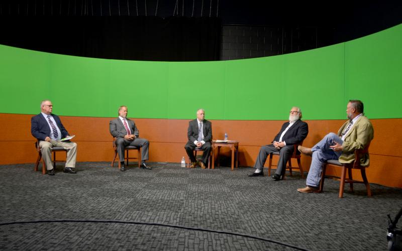The four candidates for the District 3 County Commission seat, from left, Bucky Nash, Robby Hollingsworth, Charlie Keith and Jeff Tyre, mostly agreed with each others’ points during the forum. (CARL MCKINNEY/Lake City Reporter)