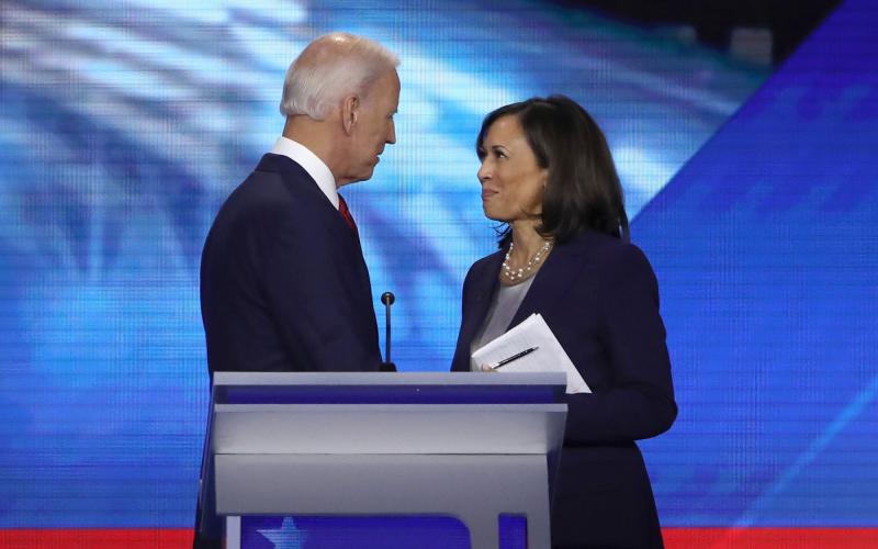 Democratic presidential candidates former Vice President Joe Biden and Sen. Kamala Harris (D-CA) speak after the Democratic Presidential Debate at Texas Southern University's Health and PE Center on Sept. 12, 2019 in Houston, Texas. (WIN MCNAMEE/Getty Images/TNS)