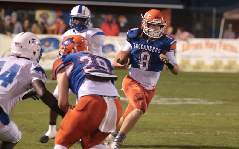 Branford quarterback Seth Heiderman, shown running against Interlachen last year, enjoyed a big opening week of distributing the ball to a handful of playmakers. (SUWANNEE DEMOCRAT)