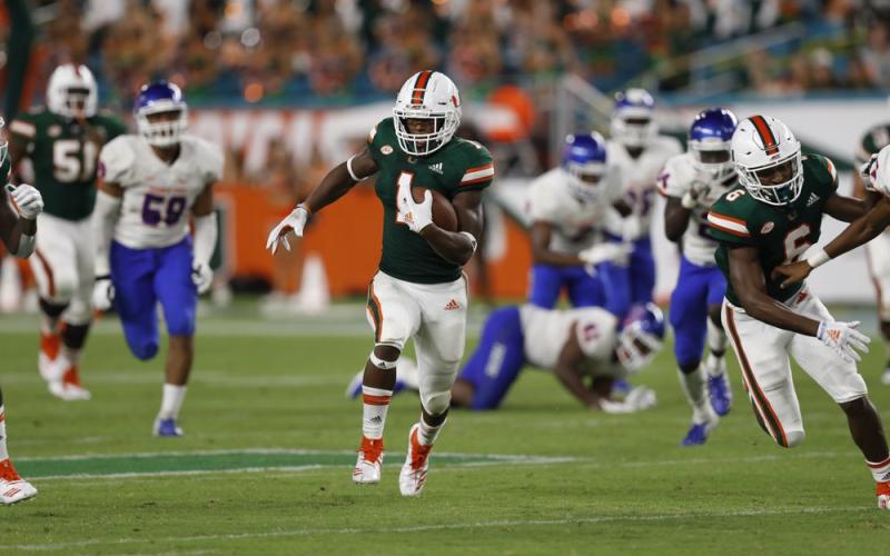 Former Miami running back Lorenzo Lingard runs in for a touchdown against Savannah State on Sept. 8, 2018, in Miami Gardens. No. 5 Florida will rely on a number of newcomers, including Lingard, as it tries to dethrone rival Georgia in the Southeastern Conference’s East Division. Some of them are freshmen, others are transfers. (AP FILE PHOTO)