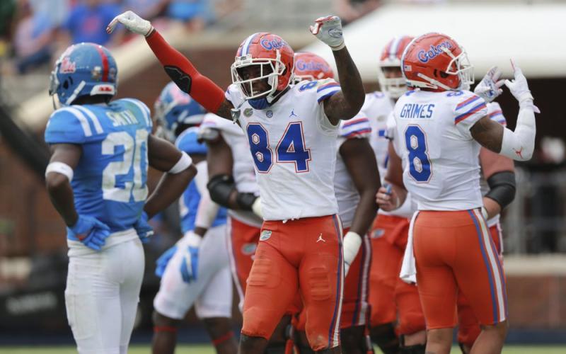 Florida receiver Kyle Pitts celebrates his fourth touchdown of the day on Saturday, in Oxford, Miss. (THOMAS WELLS/The Northeast Mississippi Daily Journal via AP)