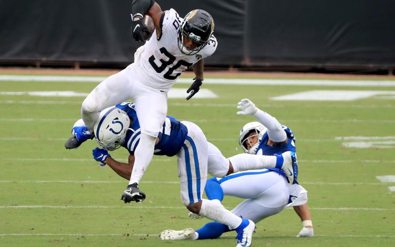 Jacksonville Jaguars running back James Robinson (30) of the runs for yardage against the Indianapolis Colts at TIAA Bank Field on Sunday, in Jacksonville. (SAM GREENWOOD/Getty Images/TNS)