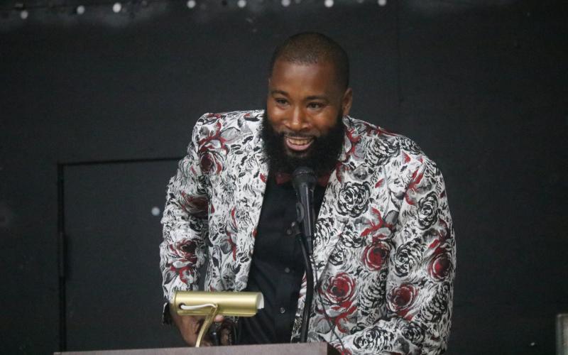 Former Suwannee basketball player Antwan Jones speaks during the school’s Hall of Fame induction ceremony last Thursday. Jones was one of five inducted. (JAMIE WACHTER/Lake City Reporter)
