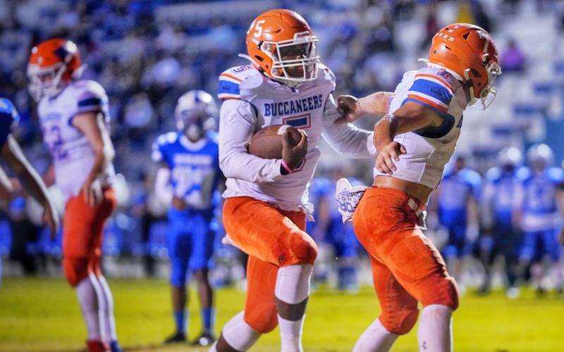 Markell Pugh takes a carry up the field against Interlachen last Friday. (BRIAN LEWIS/Special to the Reporter)