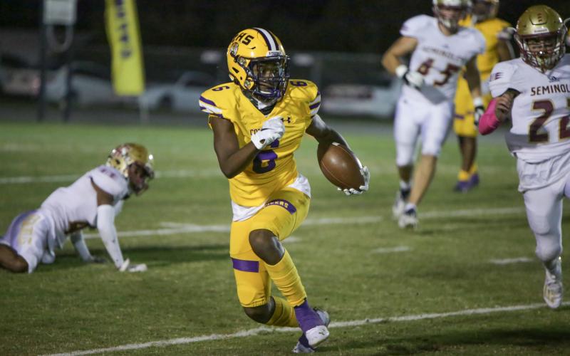 Columbia receiver Tray Tolliver runs up the field after a catch against Florida High last Friday. (BRENT KUYKENDALL/Lake City Reporter)