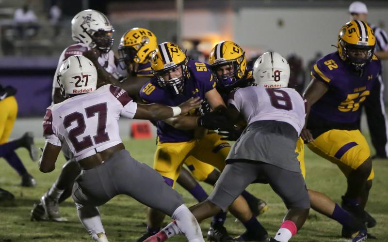 Columbia offensive lineman Joshua Simpson blocks during a play against Madison County on Oct. 9. (BRENT KUYKENDALL/Lake City Reporter)