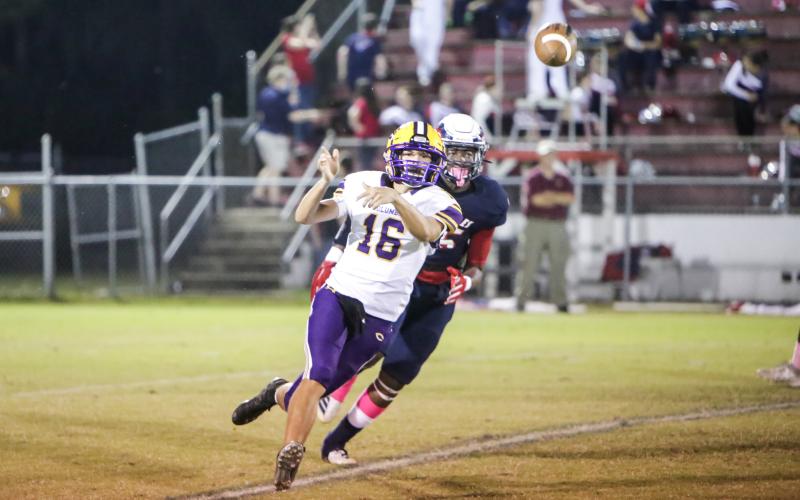 Columbia quarterback Bronsen Tillotson throws a pass in the second half Friday night against Wakulla at J.D. Jones Stadium. (BRENT KUYKENDALL/Lake City Reporter)