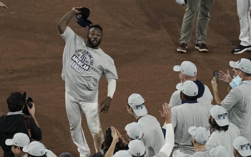 Tampa Bay Rays left fielder Randy Arozarena celebrates his MVP award following their victory against the Houston Astros in Game 7 of the American League Championship Series on Saturday in San Diego. The Rays defeated the Astros 4-2 to win the series 4-3 games. (JAE C. HONG/Associated Press)