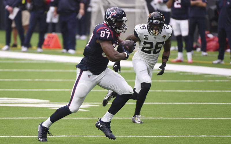Houston Texans wide receiver Brandin Cooks (13) makes a catch against the Jacksonville Jaguars on Sunday in Houston. (MICHAEL WYKE/Associated Press)