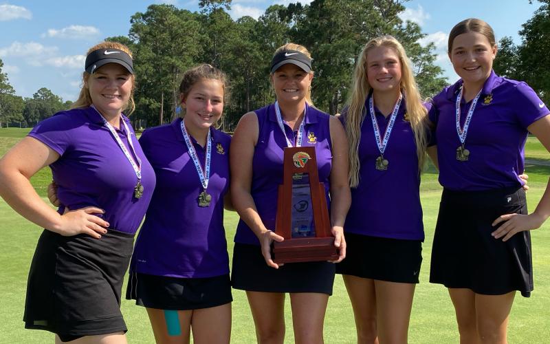 Columbia’s girls golf team won the District 2-2A title on Tuesday at Quail Heights. Pictured are Reece Chasteen (from left), Kayla Hardy, coach Tammy Winnett, Payton Gainey and Ashley Nelson. (COURTESY)