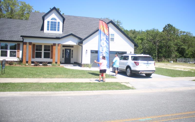 People arrive to look at a house on last year’s Parade of Homes. (FILE)