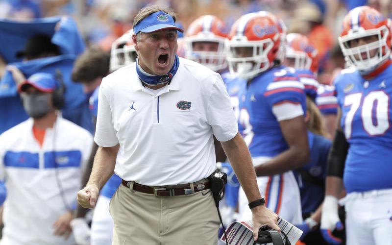 Florida head coach Dan Mullen yells to a referee about a call during a game against South Carolina on Oct. 3 in Gainesville. (AP FILE PHOTO)