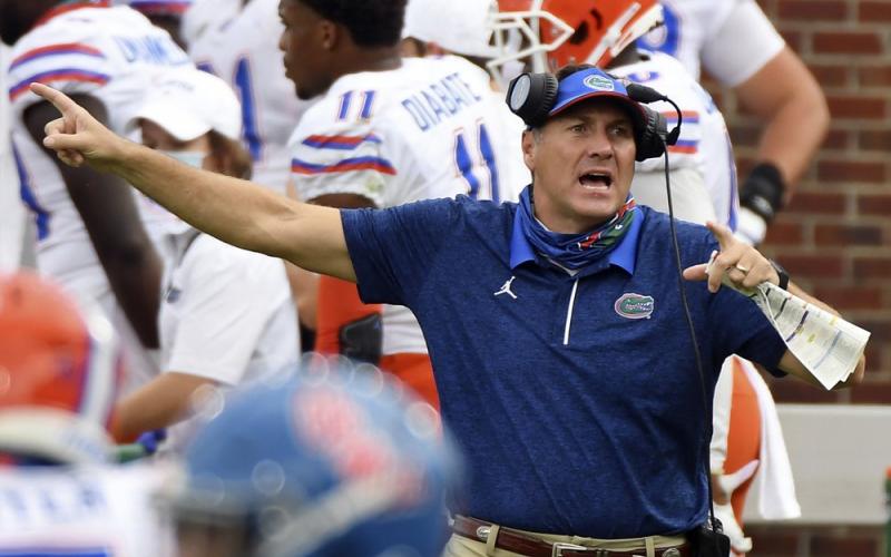 Florida head coach Dan Mullen reacts during the second half of a game against Mississippi on Sept. 26 in Oxford, Miss. No. 10 Florida resumed meetings and practices for the first time in two weeks Monday. They got back to work after a covid-19 outbreak caused the Southeastern Conference to postpone two of the team’s games. (AP FILE PHOTO)