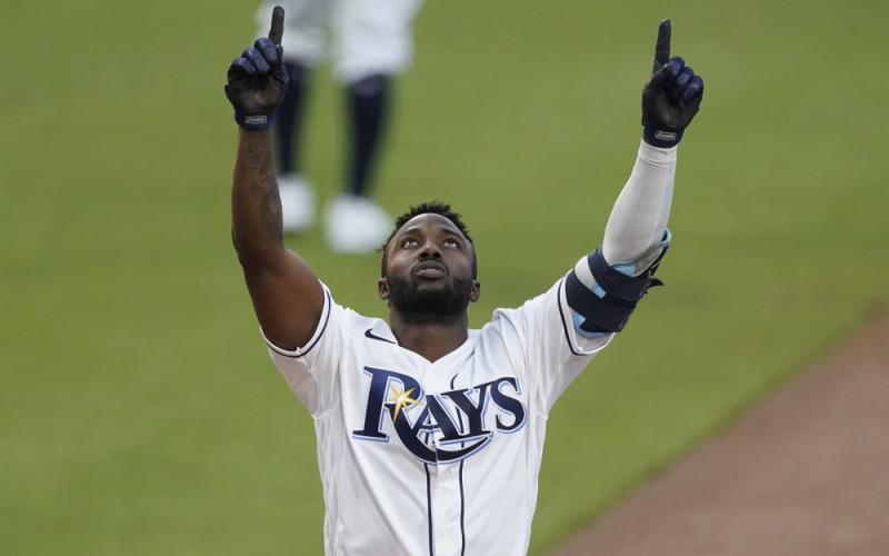 Tampa Bay Rays Randy Arozarena celebrates after hitting a two run home run against the Houston Astros during the first inning in Game 7 of the American League Championship Series on Saturday in San Diego. (ASHLEY LANDIS/Associated Press)