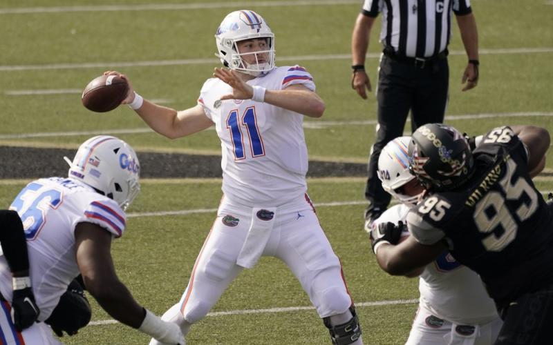 Florida quarterback Kyle Trask (11) passes against Vanderbilt on Saturday in Nashville, Tenn. (MARK HUMPHREY/Associated Press)