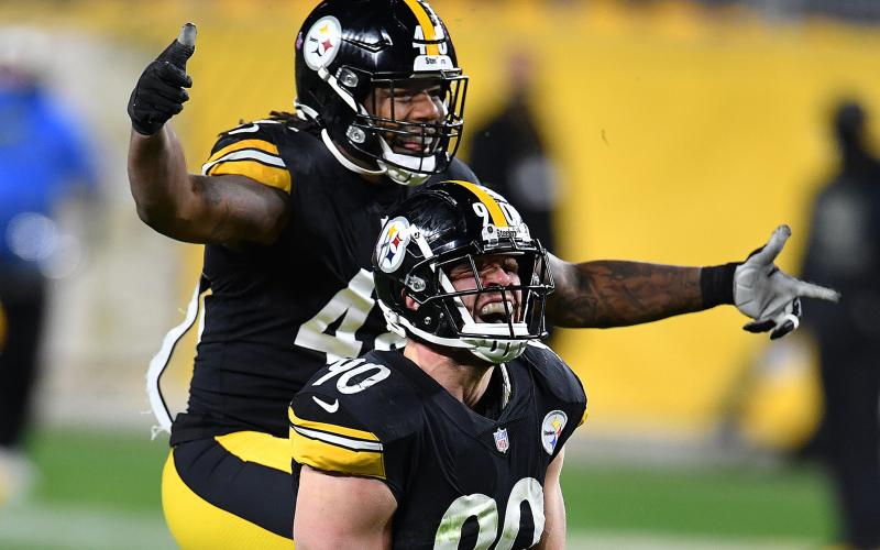 Pittsburgh Steelers linebackers T.J. Watt and Bud Dupree celebrate after sacking Cincinnati Bengals quarterback Joe Burrow on Nov. 15 at Heinz Field in Pittsburgh, Pennsylvania. (PETER DIANA Diana/Pittsburgh Post-Gazette/TNS)
