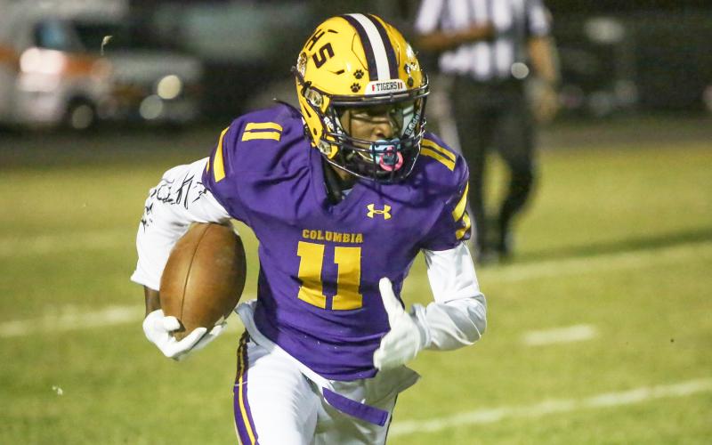 Columbia receiver Jaquez Redic runs up the field after a catch against Seabreeze during last Friday’s Region 1-6A quarterfinal. The Tigers host Daytona Beach Mainland in the regional semis Friday night at 7:30 p.m. (BRENT KUYKENDALL/Lake City Reporter)