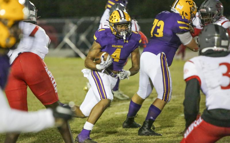 Columbia running back Jaelin Brown takes a carry up the field against Seabreeze during Friday’s Region 1-6A quarterfinal. (BRENT KUYKENDALL/Lake City Reporter)