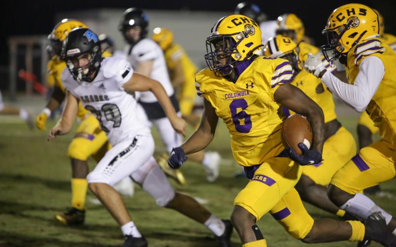 Columbia receiver Tray Tolliver returns the game’s opening kickoff for a touchdown against Ponte Vedra during Friday night’s Region 1-6A playoff game. (BRENT KUYKENDALL/Lake City Reporter)