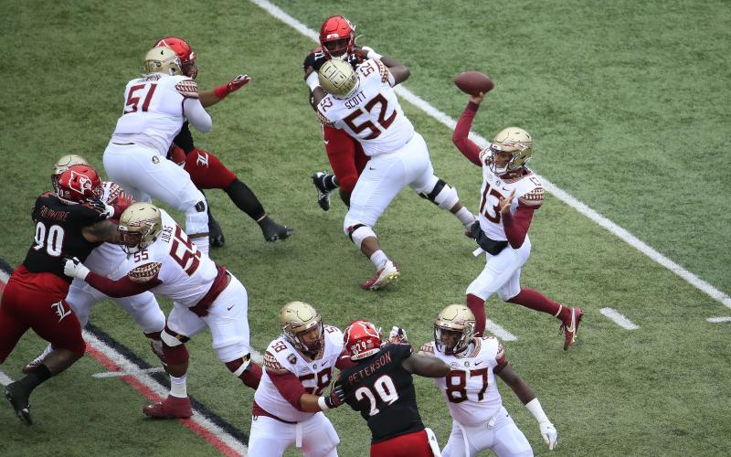 Florida State Seminoles quarterback Jordan Travis (13) passes the ball against the Louisville Cardinals at Cardinal Stadium on Oct. 24 in Louisville, Kentucky. (ANDY LYONS/Getty Images/TNS)