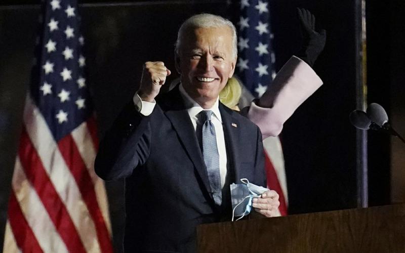 Democratic presidential candidate former Vice President Joe Biden speaks to supporters early Wednesday in Wilmington, Del. (PAUL SANCYA/Associated Press)