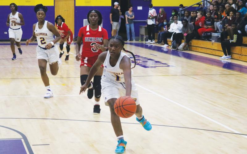 Columbia guard Anzarria Jerkins chases down a loose ball for a steal and layup against Hamilton County during Tuesday’s preseason game. (JORDAN KROEGER/Lake City Reporter)