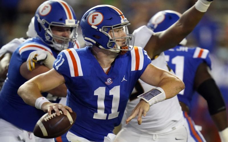 Florida quarterback Kyle Trask (11) looks for a receiver against Missouri on Saturday in Gainesville. (JOHN RAOUX/Associated Press)