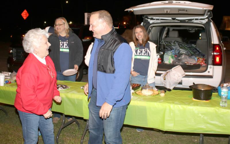 Kyle Keen (right) celebrates with a supporter after he was elected the Columbia County Tax Collector during Tuesday’s election. (TONY BRITT/Lake City Reporter)