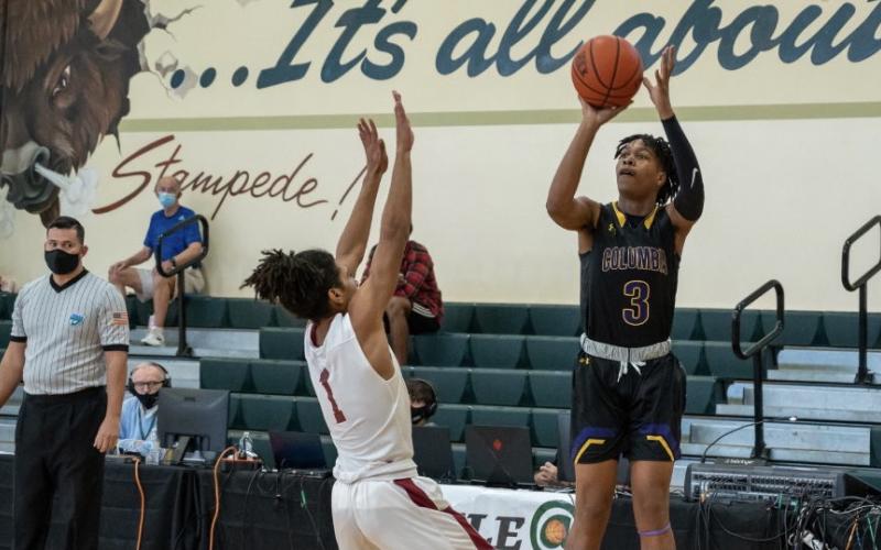 Columbia guard Charleston Ponds lets a shot fly against West Nassau in the fifth-place game at the Battle at The Villages on Wednesday. (COURTESY)