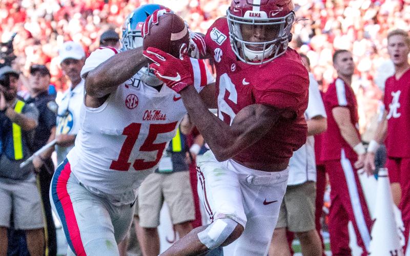 Alabama receiver DeVonta Smith catches a touchdown against Ole Miss on Sept. 28, 2019. (MICKEY WELSH/TNS)