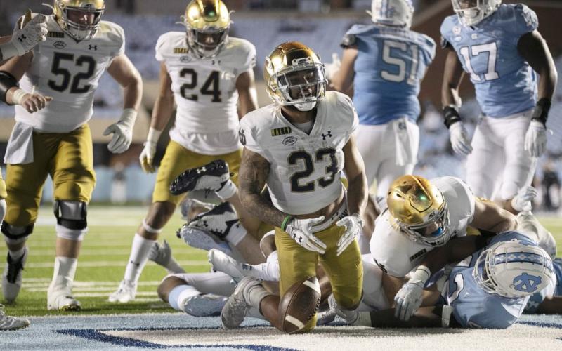 Notre Dame's Kyren Williams (23) reacts after scoring on a 1-yard carry against North Carolina on Nov. 27 in Chapel Hill, N.C. (ROBERT WILLET/The News &amp; Observer via AP, Pool)
