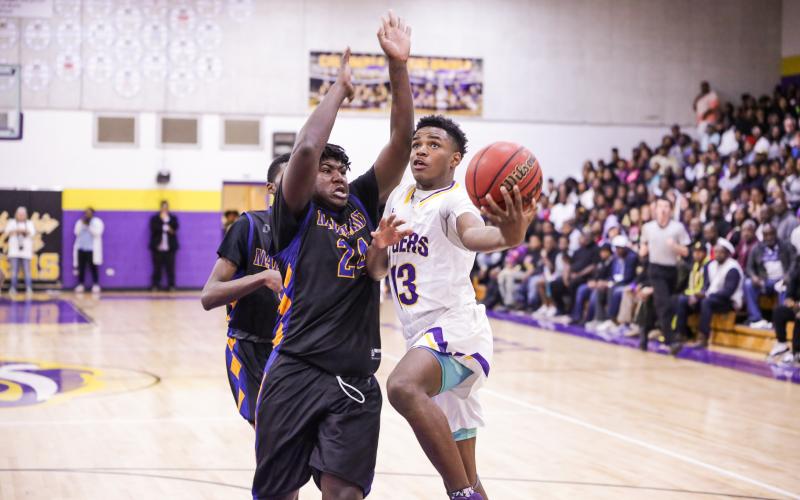 Columbia guard Tray Tolliver goes up for a shot against Dayton Beach Mainland during last season’s Region 1-6A final on Feb. 28. (BRENT KUYKENDALL/Lake City Reporter)