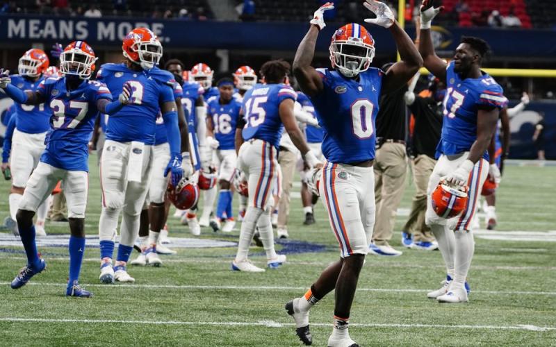 Florida players celebrate a Florida running back Nay'Quan Wright (6) touchdown against Alabama during the second half of the Southeastern Conference championship on Saturday in Atlanta. (BRYNN ANDERSON/Associated Press)